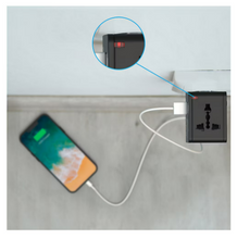 Adaptador de viaje universal Tzumi con puertos USB-C y dos puertos USB-A - Negro