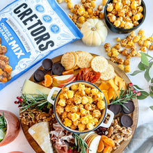 Mezcla de palomitas de maíz con sabor a queso y caramelo CRETORS, 23.5 oz.