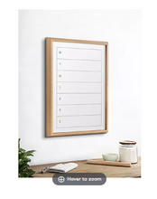 Calendario semanal enmarcado con pizarra blanca de cristal impresa de Kate y Laurel Blake, de The Creative Bunch Studio.