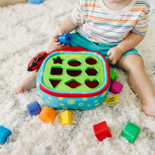 Melissa_DougK_sKidsTake-AlongShapeSorterBabyToyWith2-SidedActivityBagand9TexturedShapeBlocks4 - Brands For Less USA