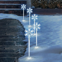 Luces LED para sendero Member's Mark Snowflake, paquete de 5 unidades.