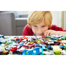 Hot Wheels Set of 8 Basic Toy Cars & Trucks in 1:64 Scale Including 1 Exclusive Car, Styles May Vary