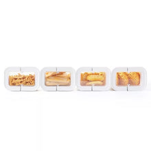 8-piece pantry storage container set with clear windows and white lids holding snacks and baked goods