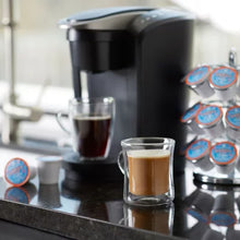 Brands For Less USA donut shop coffee pods 100 count next to single serve brewer with espresso and black coffee