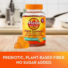 Metamucil fiber gummies no sugar added bottle with orange gummies and prebiotic fiber label