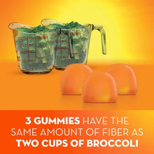 Metamucil fiber gummies no sugar added with three orange gummies and two cups of broccoli shown